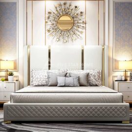 Faux Leather Upholstered and Polished Gold Bed